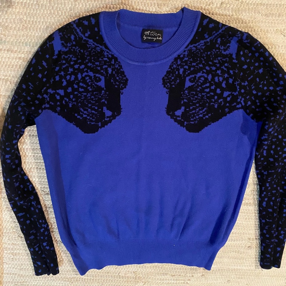 Torn By Ronny Kobo Blue Sweater with Leopard Shoulder Detail. Good Condition